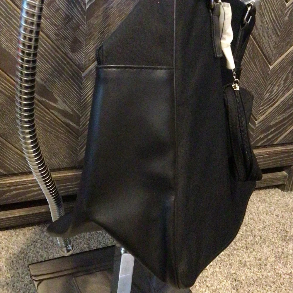 New Calvin Klein Elegant Black canvas and leather Duffel Bag
